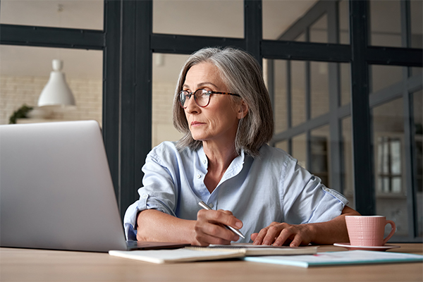 Medical Care Support Woman with Telephone Headset